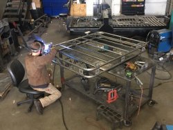 basket getting legs welded.jpg